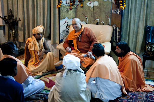 Guru with followers at Ashram
